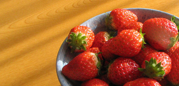 bowl of strawberries on kitchen counter - Kitchen Counter Organization